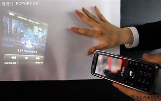 Illustration for article titled World's First Cellphone with Pico-Projector Being Produced in China